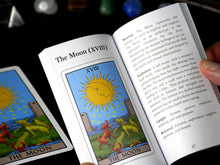 Load image into Gallery viewer, The Lustrous Tarot guidebook has been written by professional tarot reader, Philip Young, PhD. The booklet contains the meaning, symbolism, and upright/reversed keywords for all 78 cards. 
